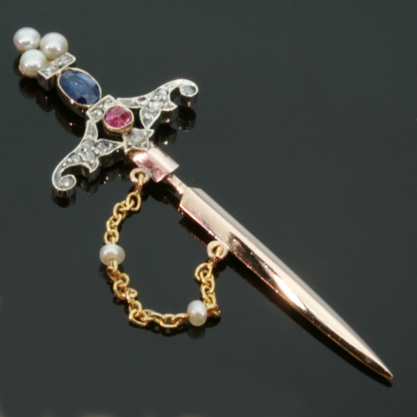 Victorian dagger or sword shaped bejeweled gold lapel pin